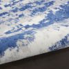 4' X 6' Ivory And Blue Ombre Distressed Area Rug