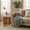 Green and White Knitted Cotton Blend Abstract Throw Blanket with Fringe