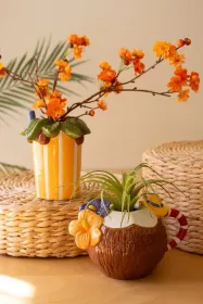 SET OF TWO CERAMIC COCKTAIL INSPIRED VASES