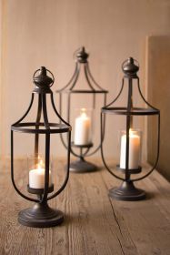 SET OF THREE METAL LANTERNS WITH GLASS INSERT