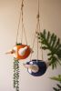 SET OF TWO HANGING  CERAMIC SWIMMERS PLANTERS - ONE EACH