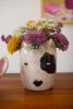 SET OF TWO CERAMIC BLACK AND WHITE DOG HEAD PLANTERS