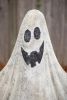 SET OF TWO PAINTED METAL GHOSTS