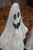 SET OF TWO PAINTED METAL GHOSTS