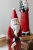 SET OF TWO RESIN SANTAS