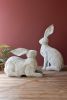 SET OF TWO RUSTIC METAL RABBITS