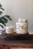 SET OF TWO CONCRETE SANTA PLANTERS