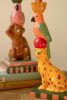 SET OF TWO CERAMIC CHEETAH AND MONKEY TAPER CANDLE HOLDERS