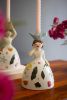 SET OF TWO CERAMIC GIRL TAPER CANDLE HOLDERS