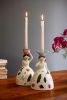 SET OF TWO CERAMIC GIRL TAPER CANDLE HOLDERS