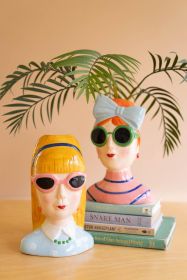 SET OF TWO CERAMIC GIRLS WITH SUNGLASSES VASES