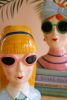 SET OF TWO CERAMIC GIRLS WITH SUNGLASSES VASES