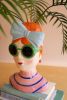 SET OF TWO CERAMIC GIRLS WITH SUNGLASSES VASES