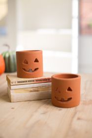 SIX SHORT TERRACOTTA JACK-O-LANTERN