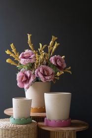SET OF THREE SCALLOPED CLAY PLANTERS
