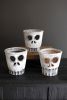 SET OF THREE HALLOWEEN SKULL VASES