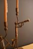 SET OF TWO FORGED IRON TRUMPET AND SAXAPHONE TAPER CANDLE HOLDERS