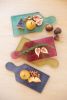 SET OF FOUR COLORED GLASS CHEESE BOARDS - ONE EACH COLOR