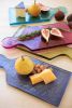 SET OF FOUR COLORED GLASS CHEESE BOARDS - ONE EACH COLOR