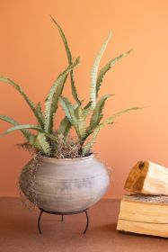 BLACK CLAY URN ON AN IRON STAND