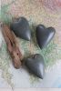 SET OF SIX HAND CARVED STONE HEARTS