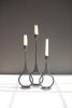 SET OF THREE CAST IRON TAPER CANDLE HOLDERS W RING DETAIL