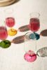 SET OF FOUR APERTIF GLASSES WITH COLORED STEMS