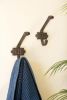 SET OF TWO CAST IRON HIS/HERS HOOKS
