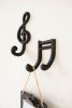 SET OF TWO CAST IRON MUSICAL NOTES HOOKS